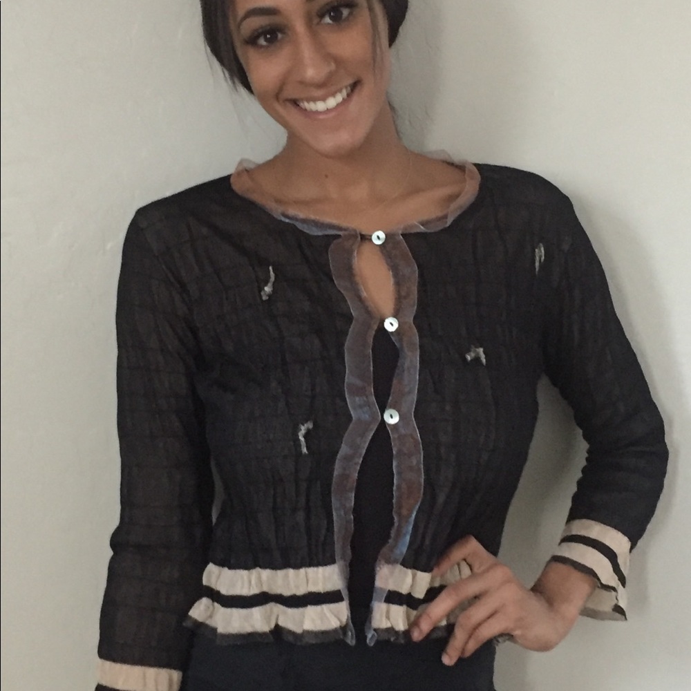 Louise della French designer top.